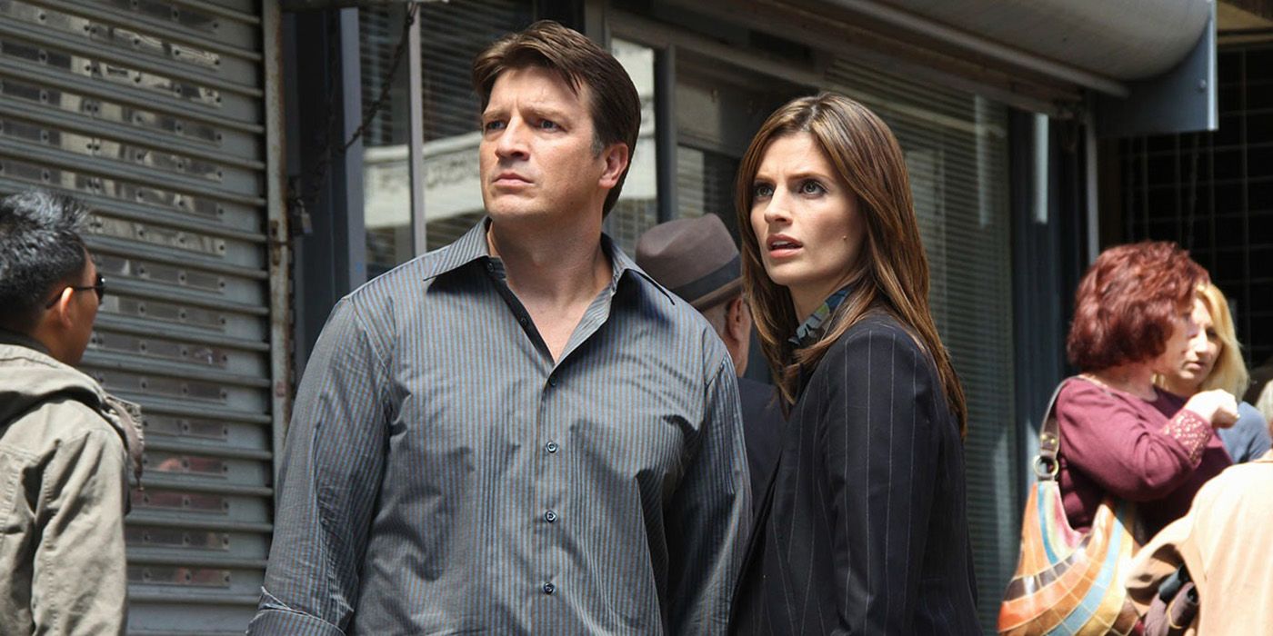 Richard and Kate from Castle looking at something, stunned.