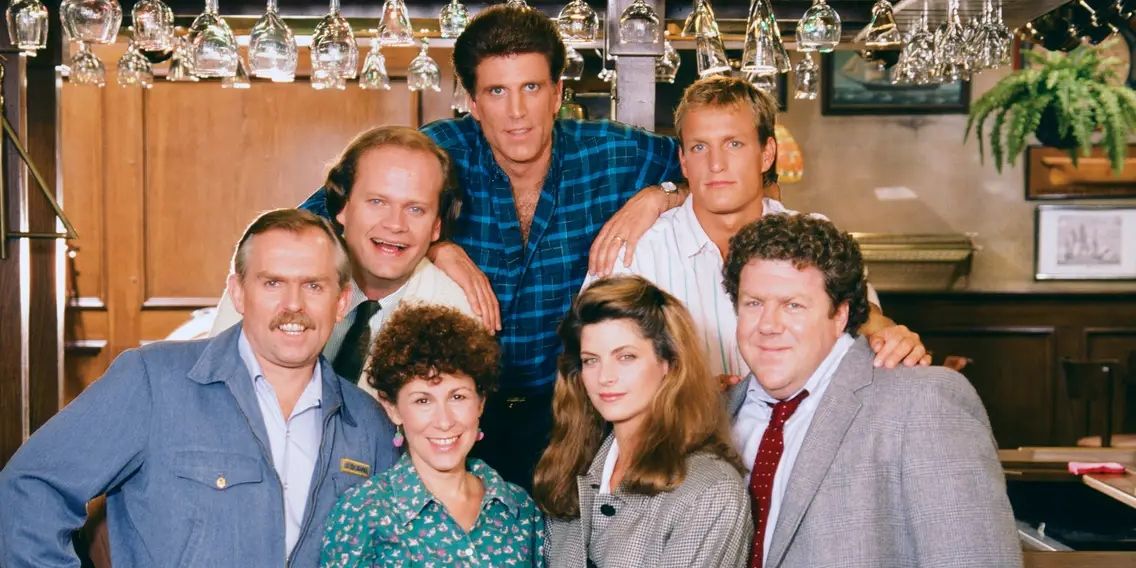 Cheers cast members pose together in a promotional image