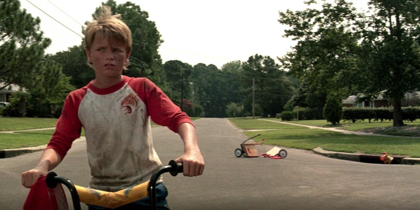 Holter Graham riding a bike in Stephen King's Maximum Overdrive