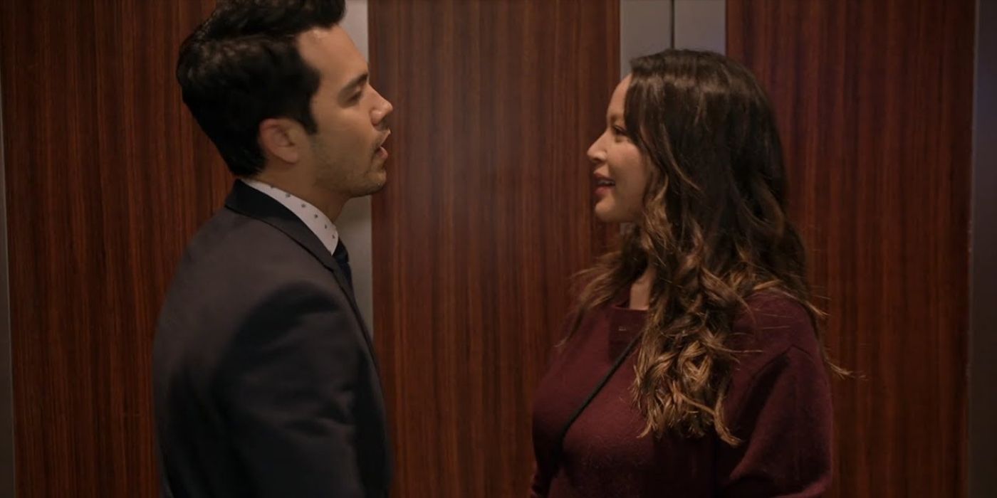 Kanoa Goo as Chris Sanford talks to Melissa O'Neil as Lucy Chen in an elevator on The Rookie