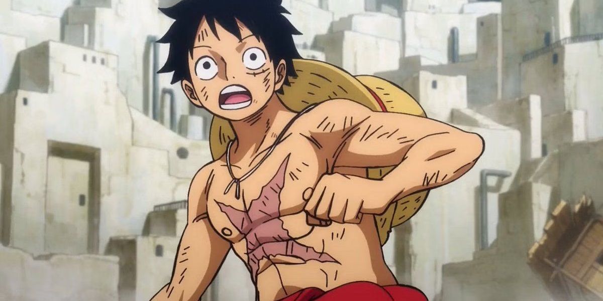 Luffy looks surprised with his chest scar showing