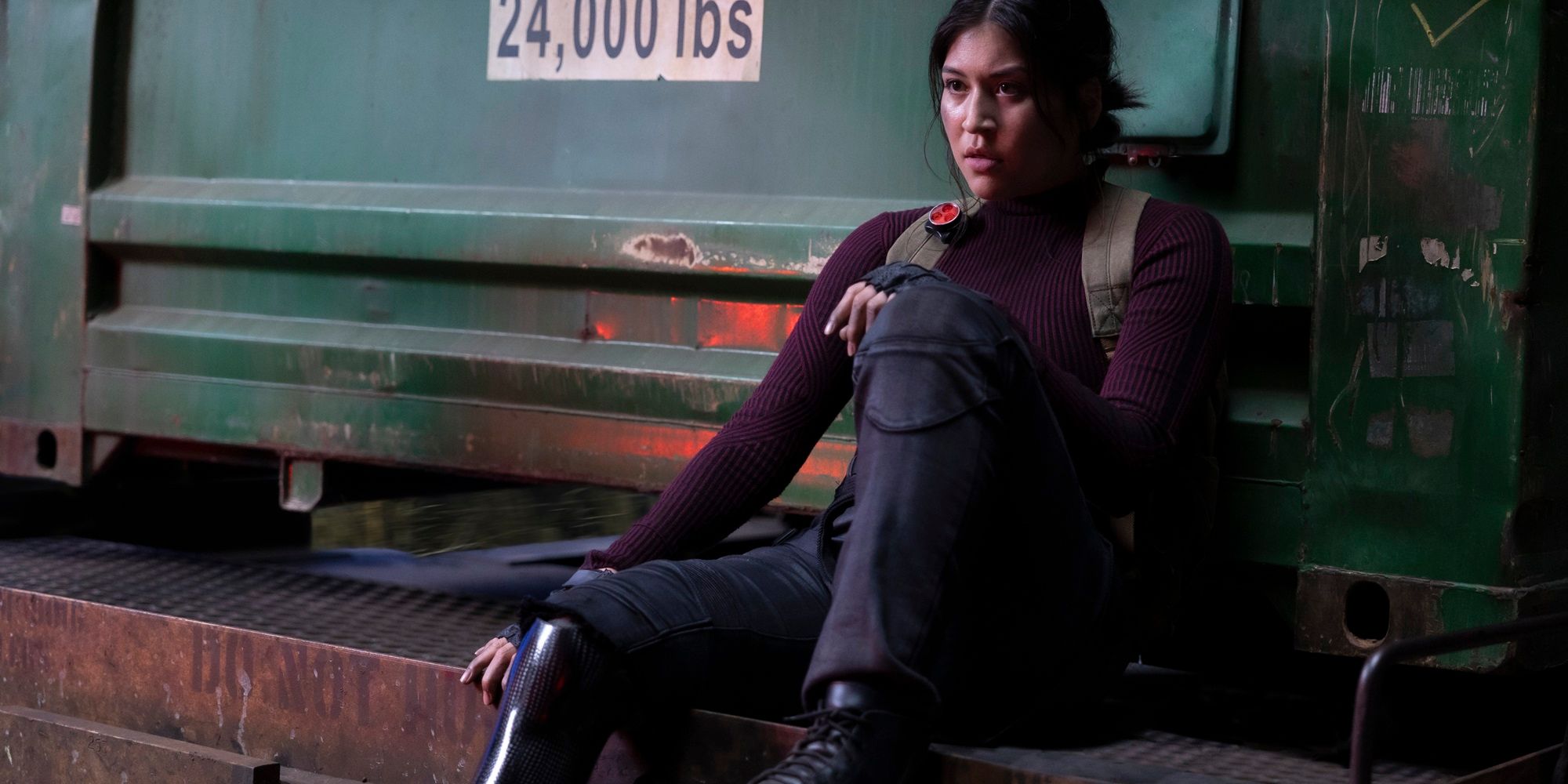 Maya Lopez resting on a traincar with a damaged prosthetic leg from Echo