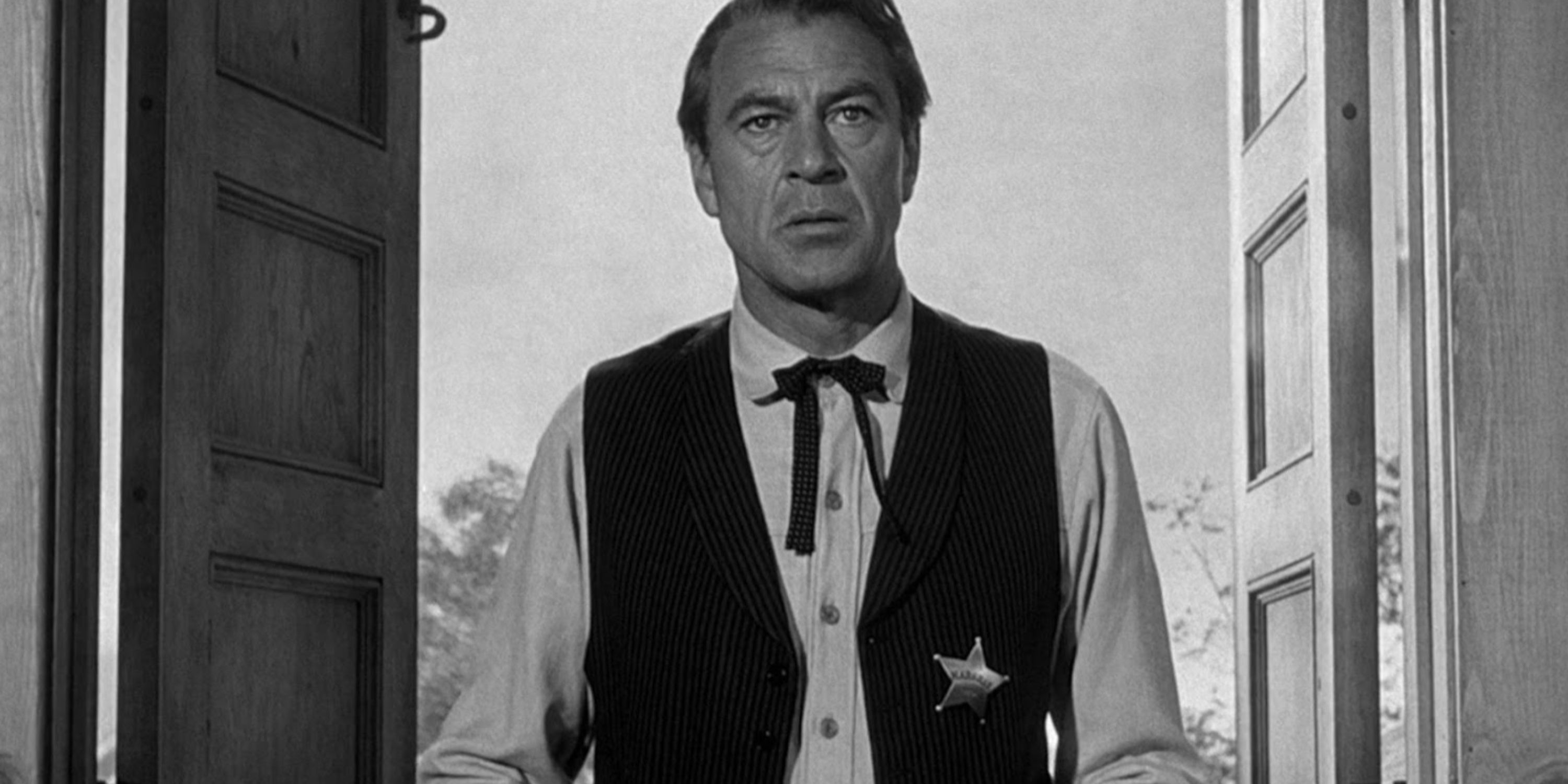 Marshal Will Kane stands in a doorway in High Noon