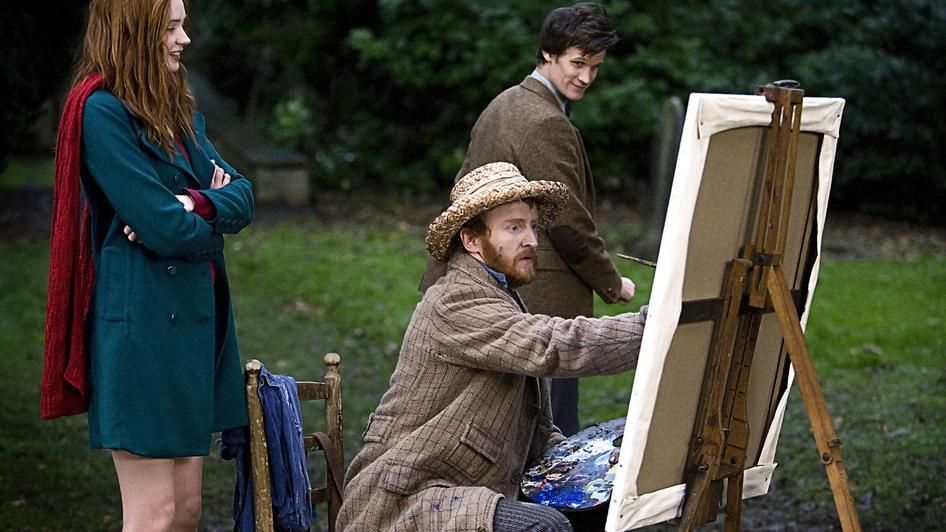 Vincent painting in a field while the Eleventh Doctor and Amy watch in Doctor Who