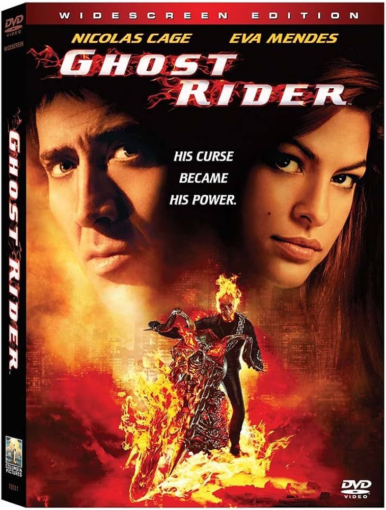 Nicholas Cage, Eva Mendes and Ghost Rider with his Flaming Motorcycle Pose on the Ghost Rider DVD Promo