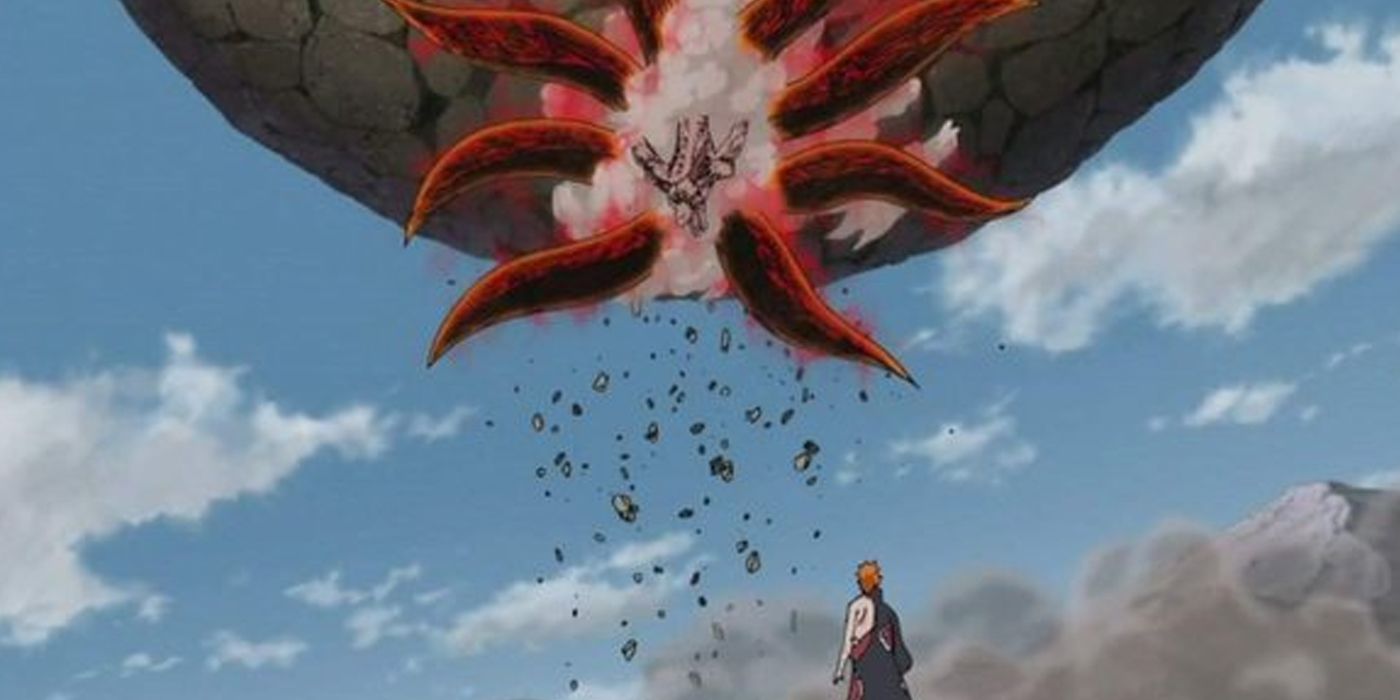 Pain standing beneath Nine-Tails Naruto in Shippuden