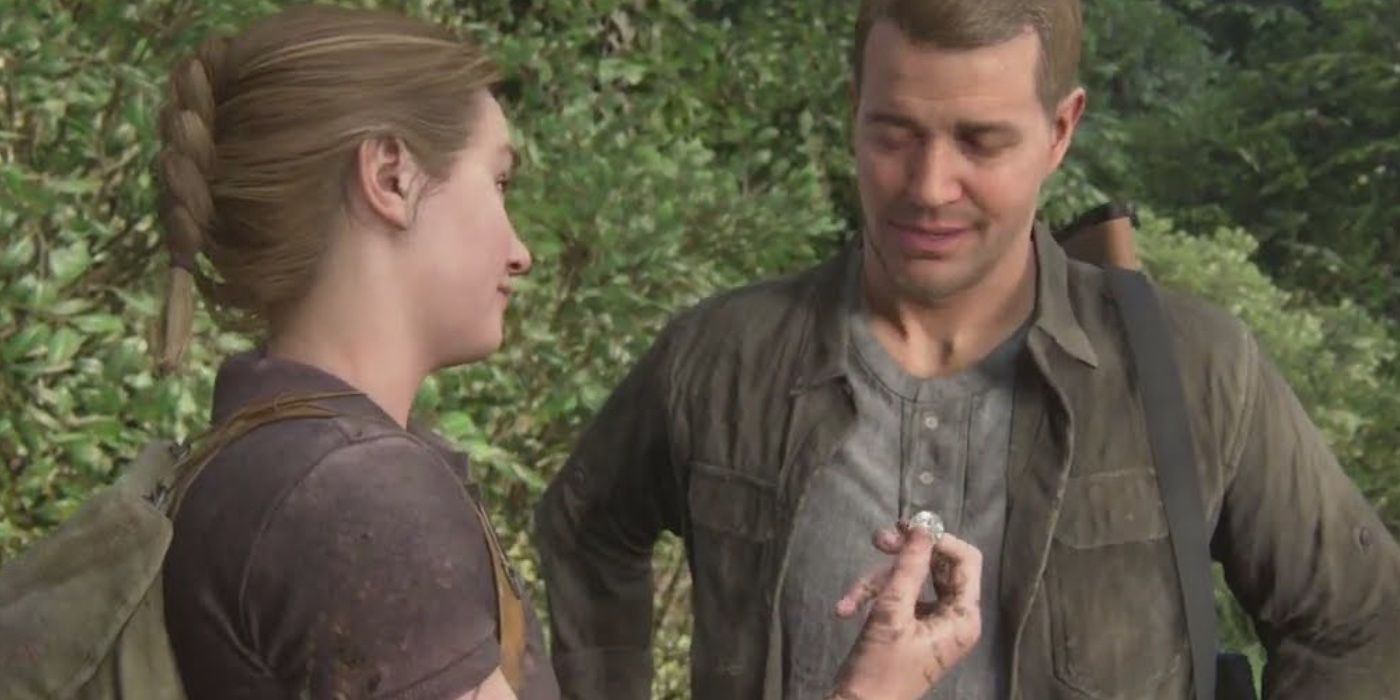 Abby Anderson giving a coin to Jerry Anderson in The Last of Us Part II