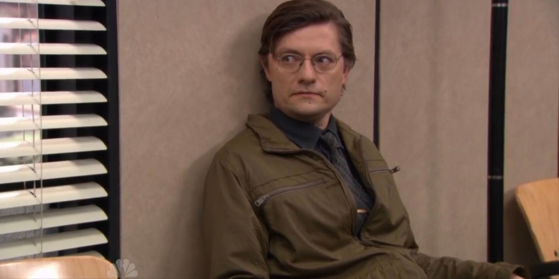 James Urbaniak's Rolf sits and listens in The Office.