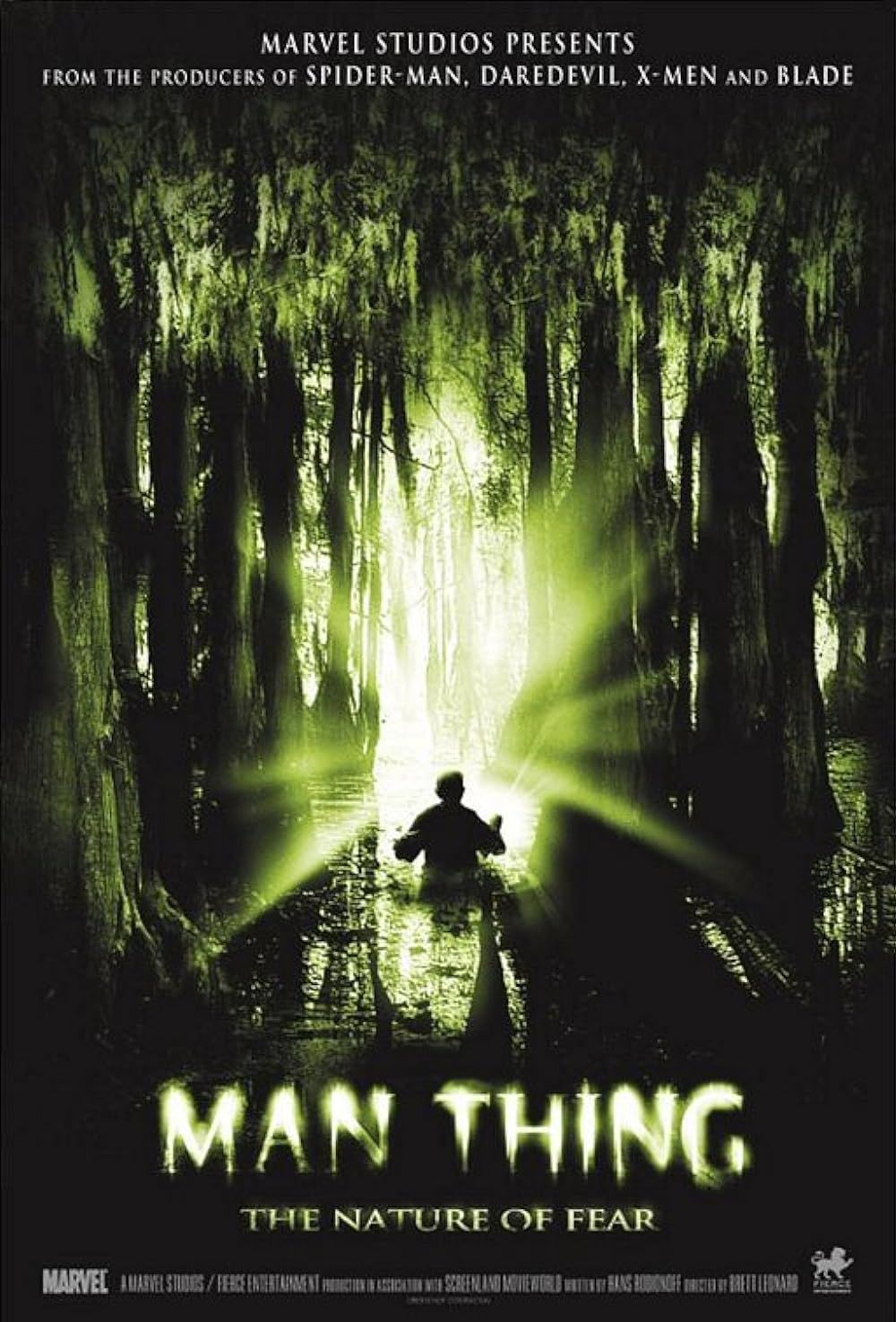 The Silhouette of a Man Walking through a Swamp on the Man-Thing Poster