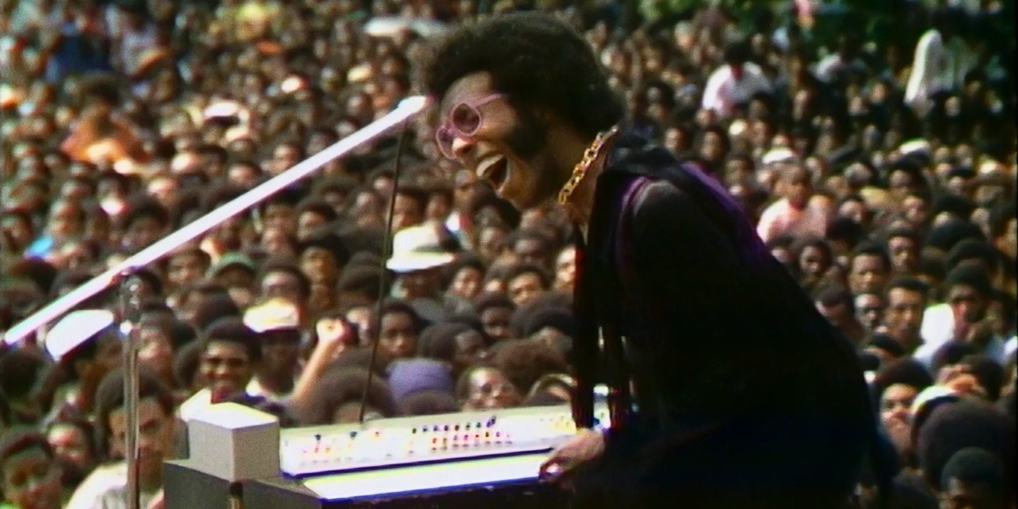Sly Stone plays the piano during the documentary Summer of Soul