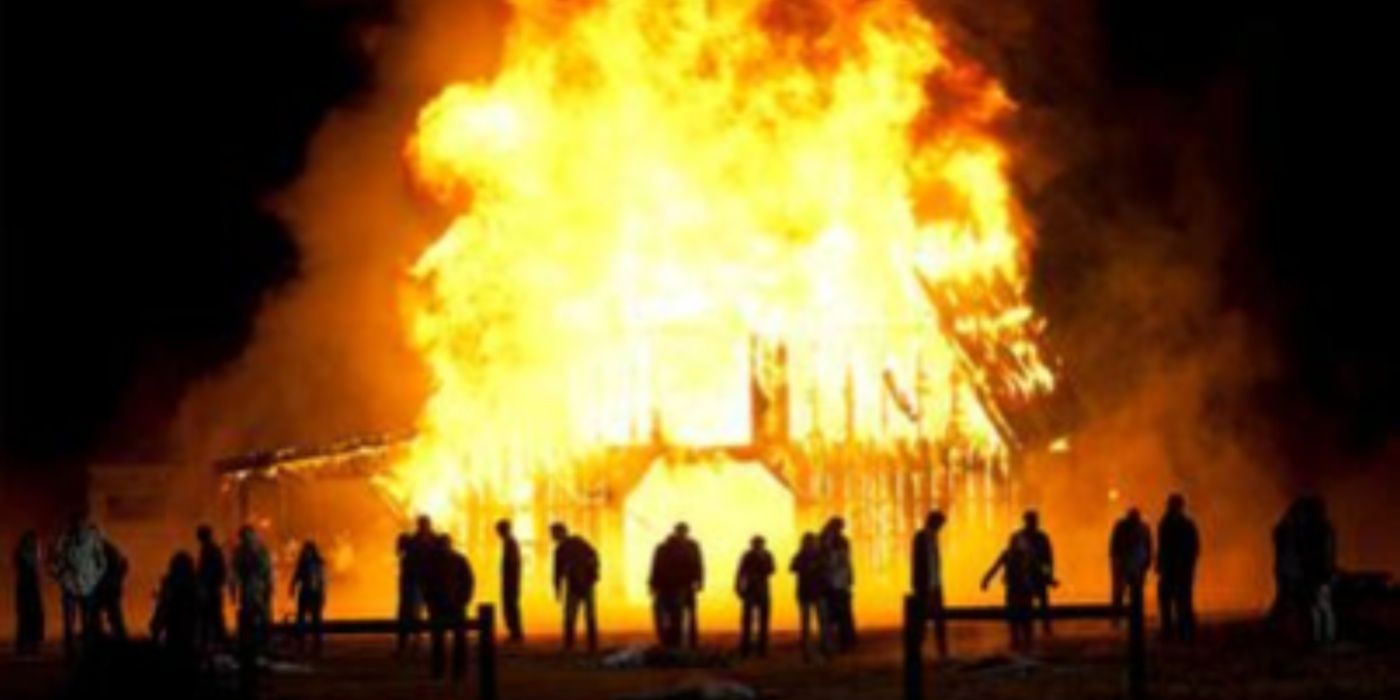 The barn burning surrounded by walkers in the episode "Beside the Dying Fire" by The Walking Dead. 