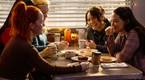D'Arcy and Asta eat in a diner in Resident Alien