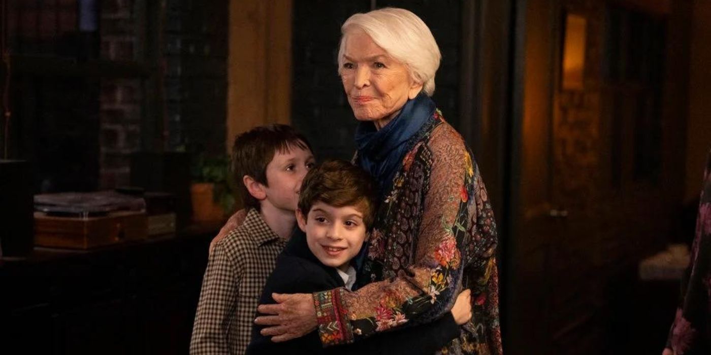 Ellen Burstyn as Bernie Stabler hugs Henry James Gross as Seamus and Colin Keane as Kieran on Law & Order_ Organized Crime