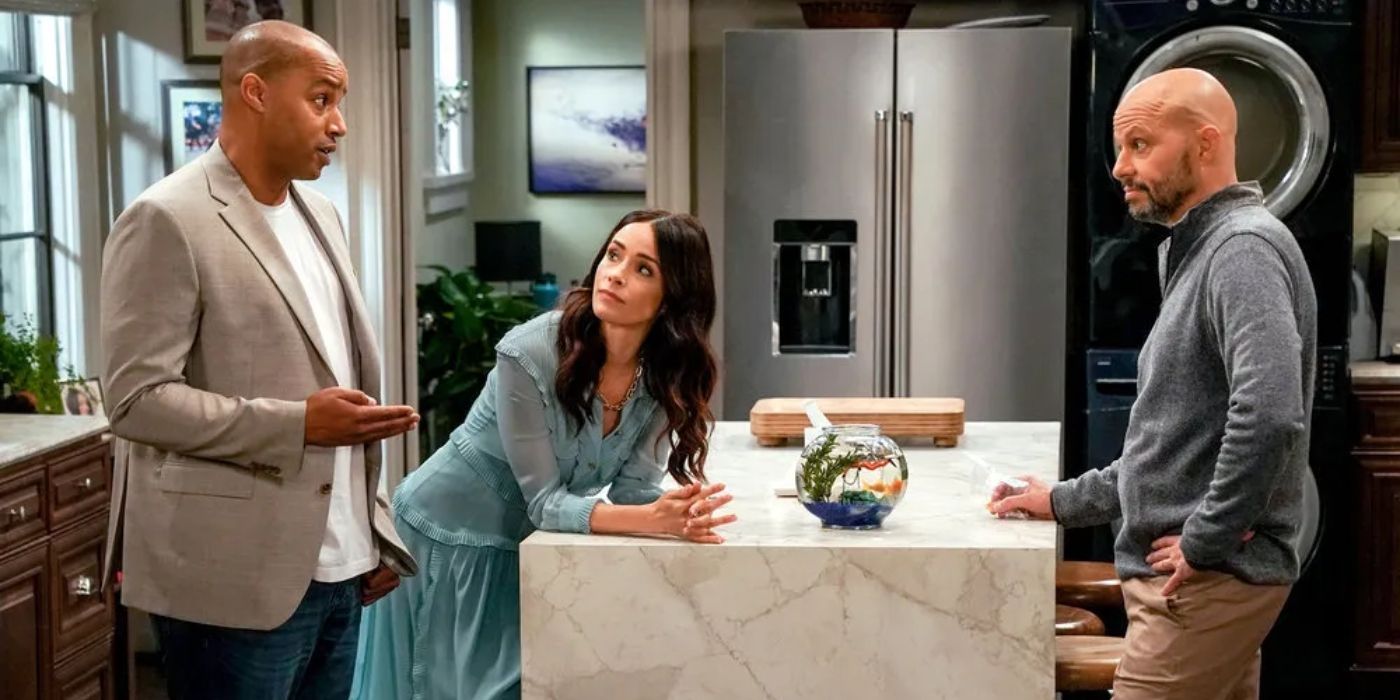 Jim, Trey and Julia stand talking in the kitchen in the NBC sitcom Extended Family