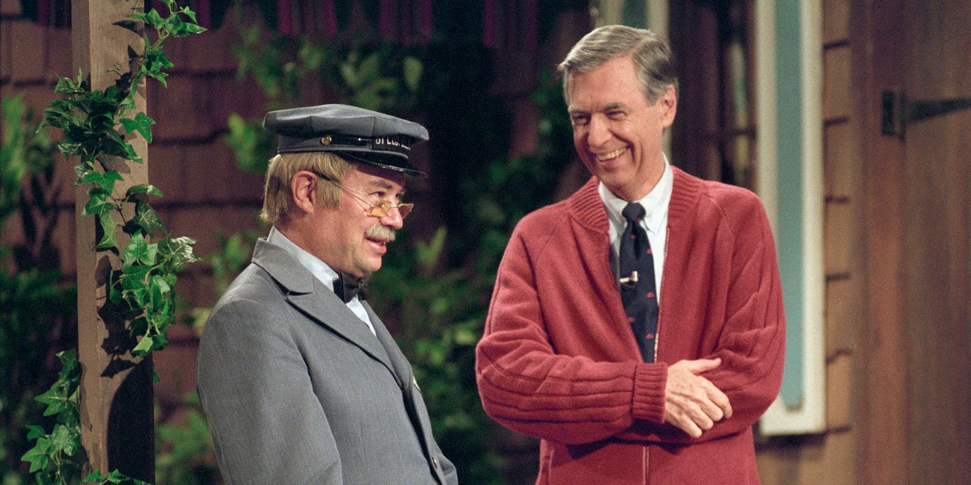 Fred Rogers talks to another man in the documentary Won't You Be My Neighbor