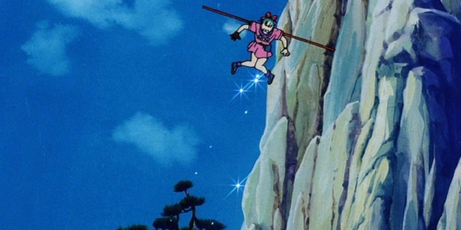 Bulma presa em uma vara pendurada em um penhasco em Dragon Ball
