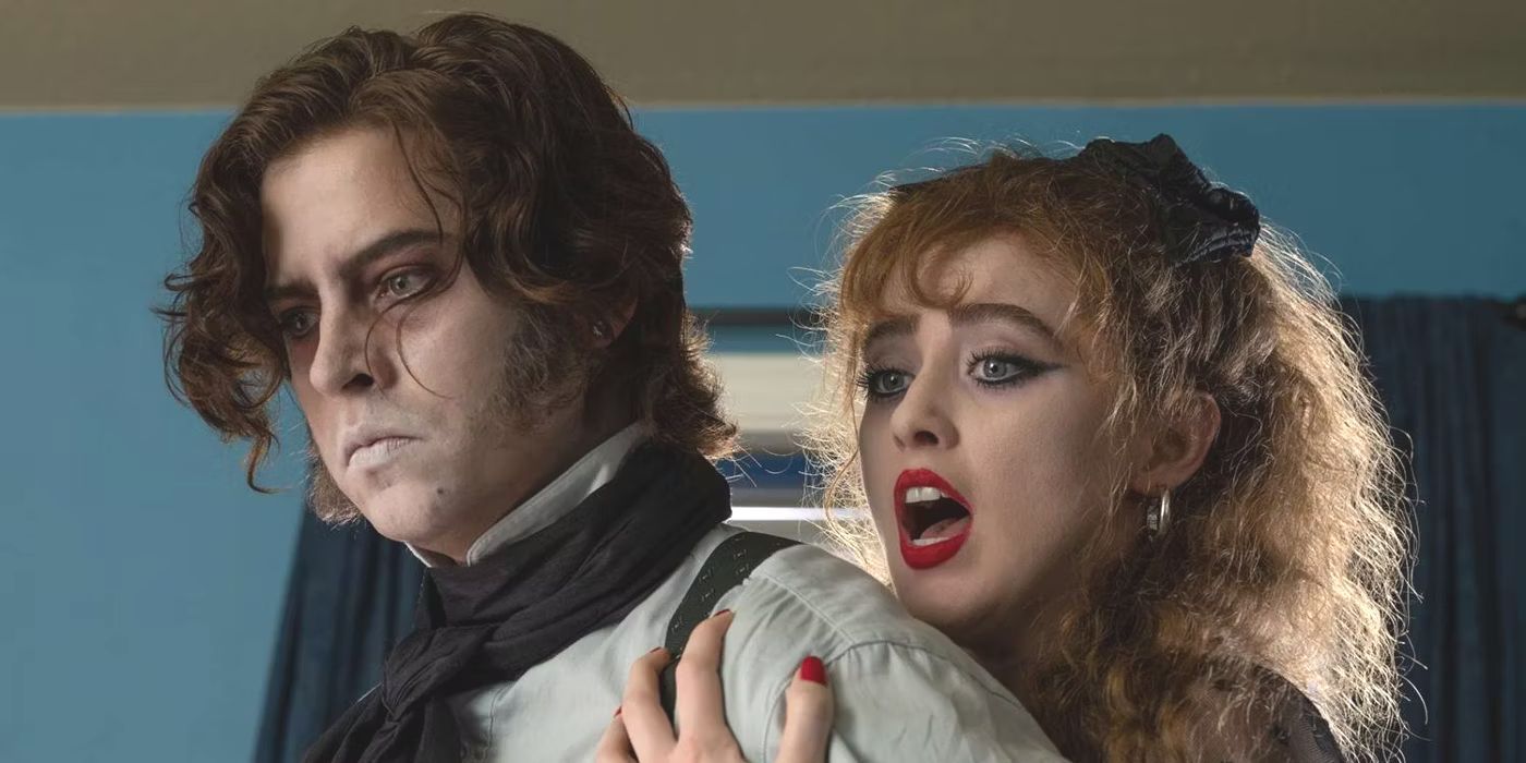 A shocked Lisa (Kathryn Newton) holds back the undead Creature in Lisa Frankenstein