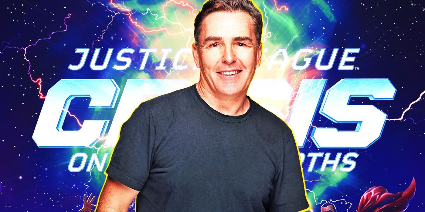 Voice actor Nolan North in black T-shirt in front of Justice League Crisis on Infinite Earths logo