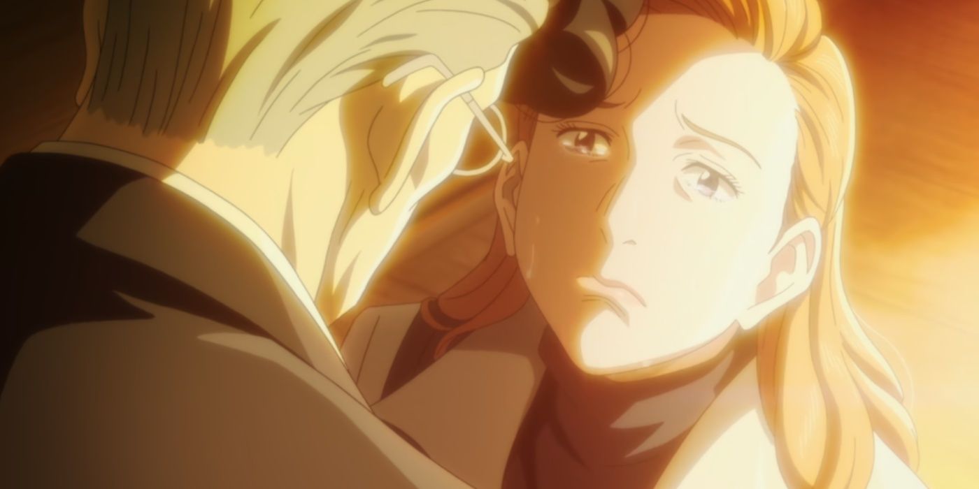 Dr. Utamaro Tenma de luto com Helena enquanto ela chora pela morte de seu marido.