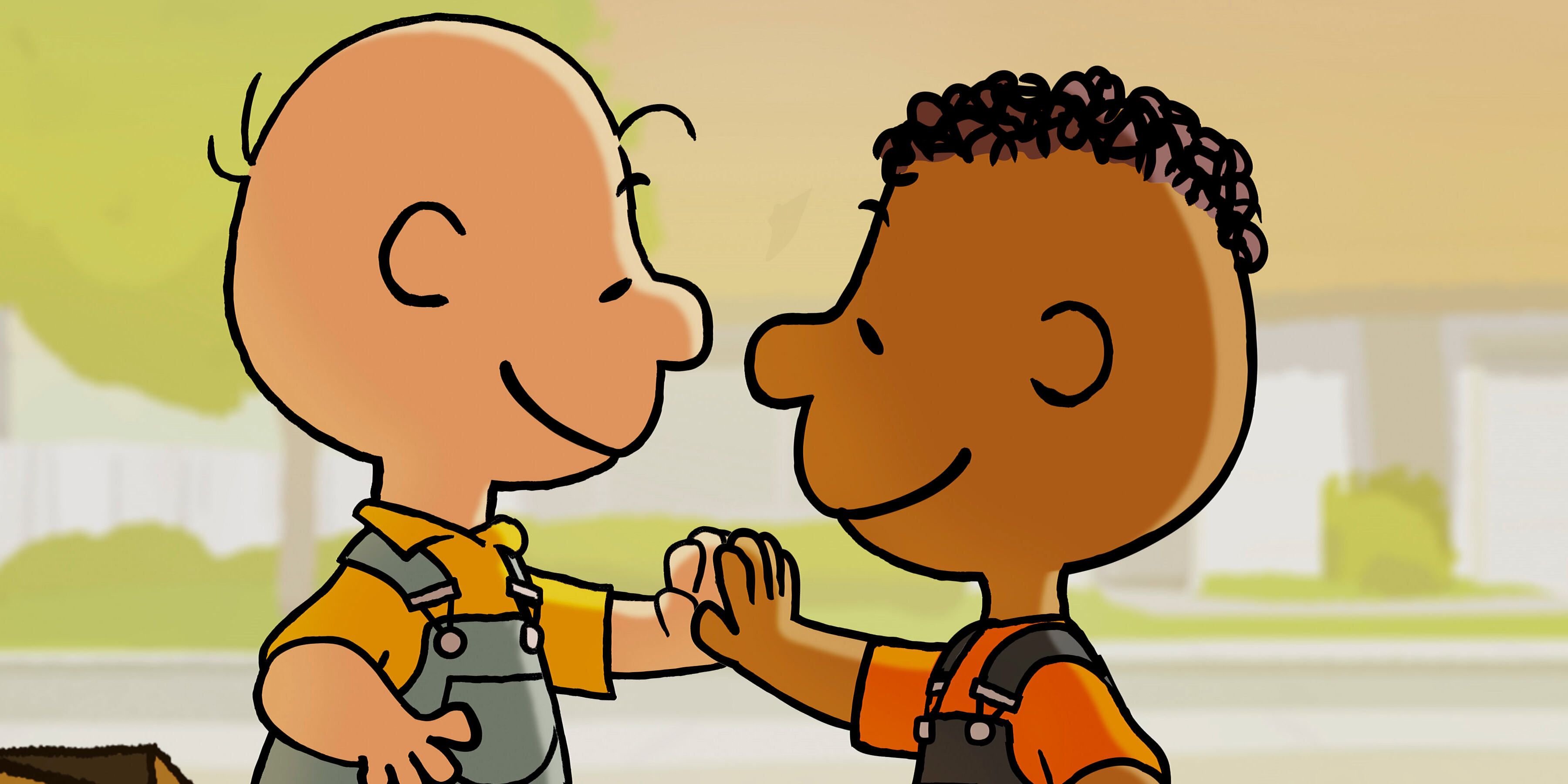 Charlie Brown and Franklin give each other a high five in Snoopy Presents: Welcome Home, Franklin