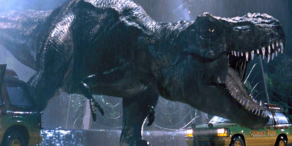 The T-Rex roars after breaking through in Jurassic Park