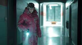 True Detective: Night Country's Danvers shines a flashlight in Tsalal