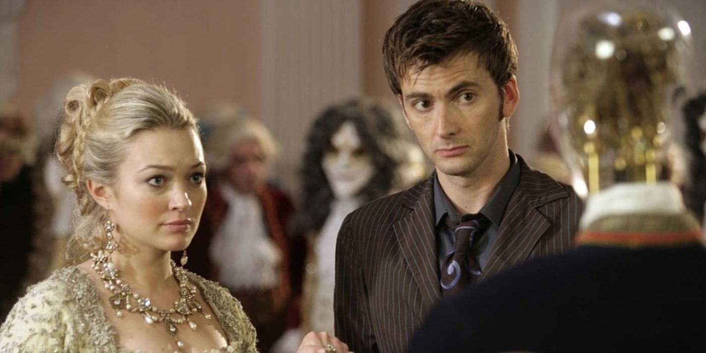 Madame de Pompadour and the 10th Doctor standing in front of a Clockwork Alien.