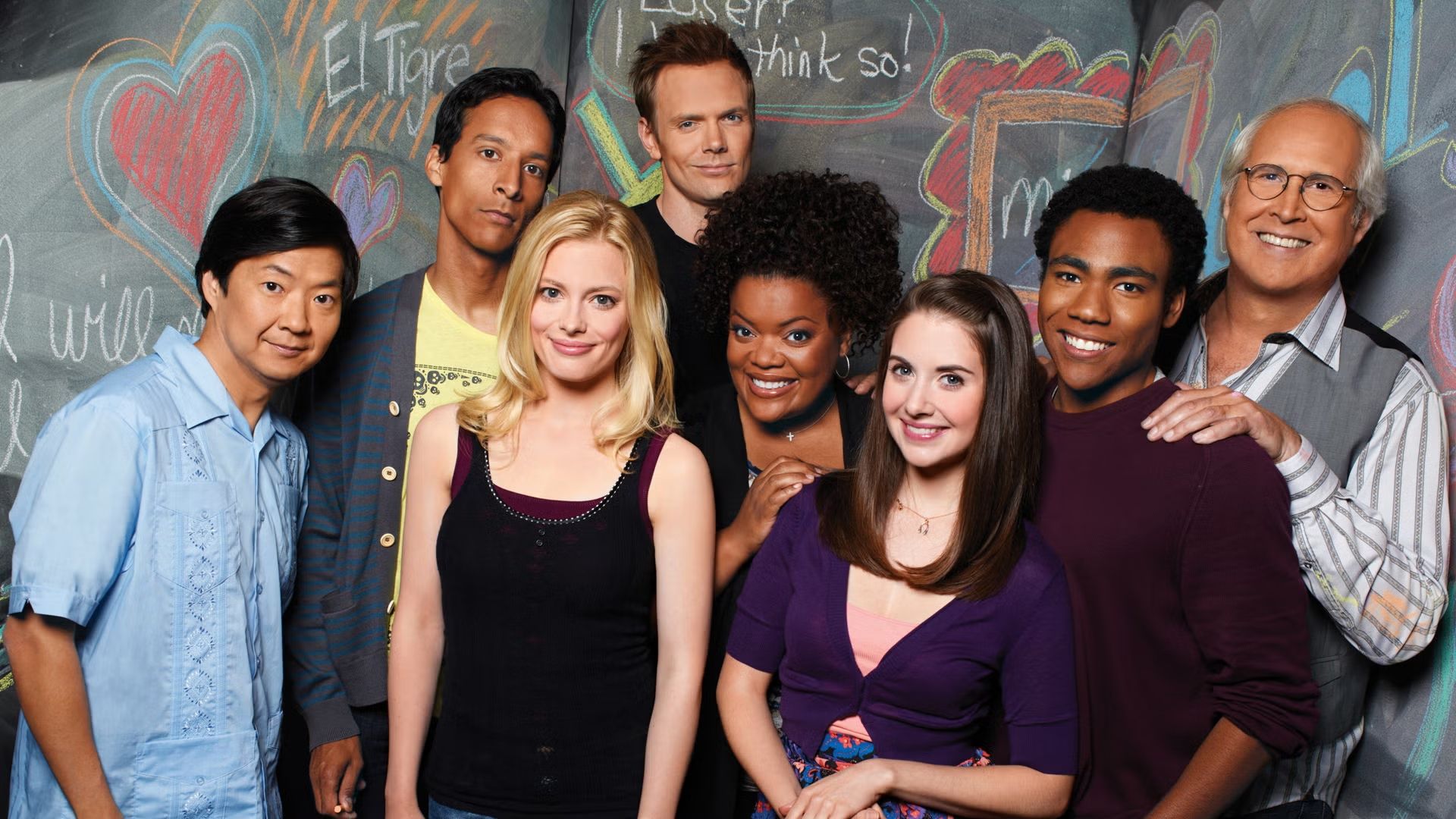 The cast of the hit TV show, Community, pose together