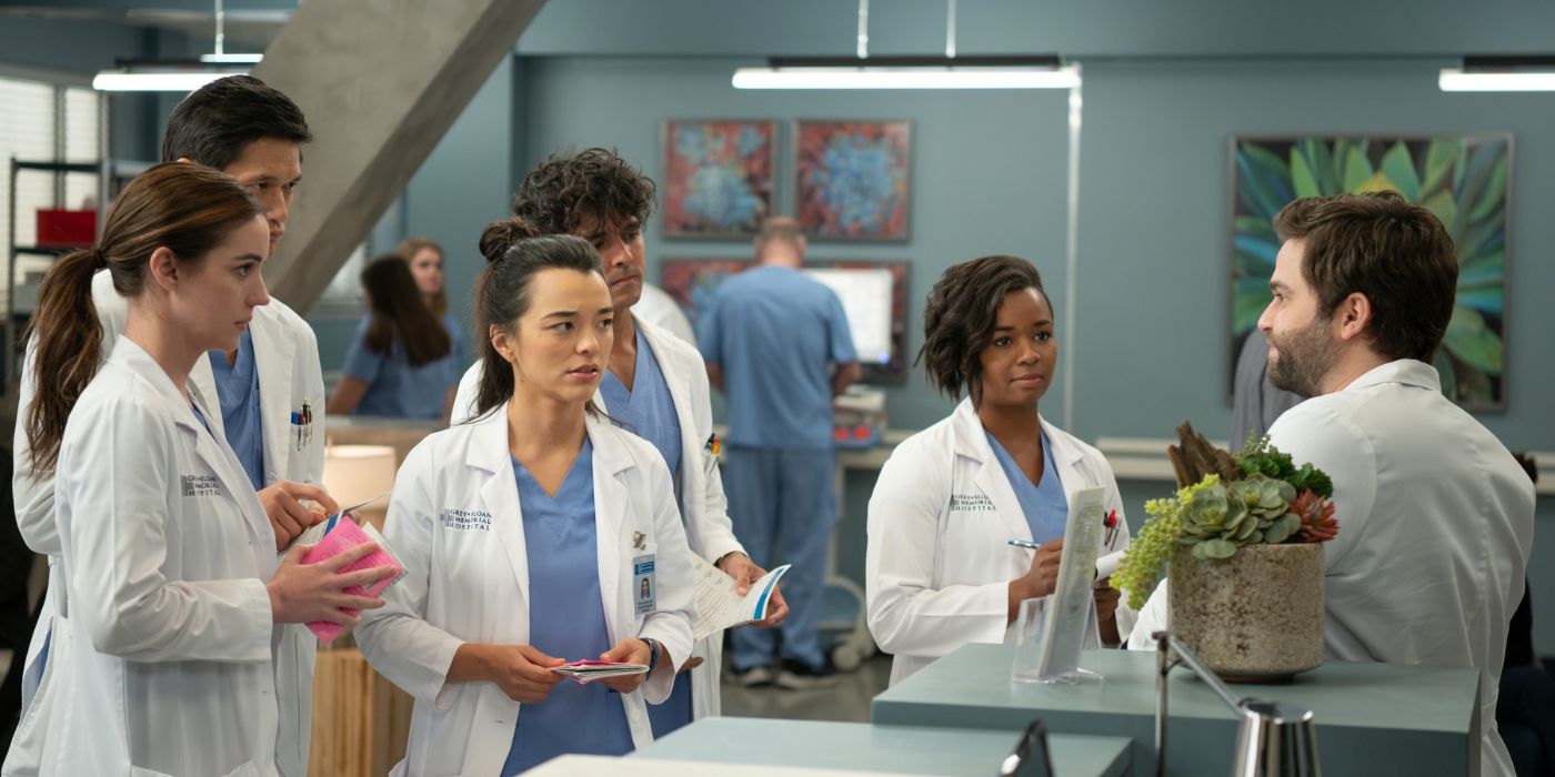 Adelaide Kane as Jules Millin, Harry Shum Jr. as Benson Kwan, Midori Francis as Mika Yasuda, Niko Terho as Lucas Adams, and Alexis Floyd as Simone Griffith talk to Jake Borelli as Levi Schmitt on Grey's Anatomy