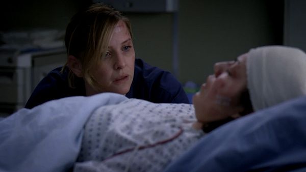 Arizona at Callie's bedside after her accident in Grey's Anatomy