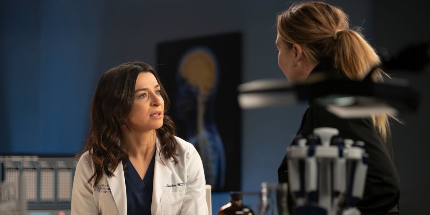 Caterina Scorsone as Amelia Shepherd talks to Ellen Pompeo as Meredith Grey in a lab on Grey's Anatomy