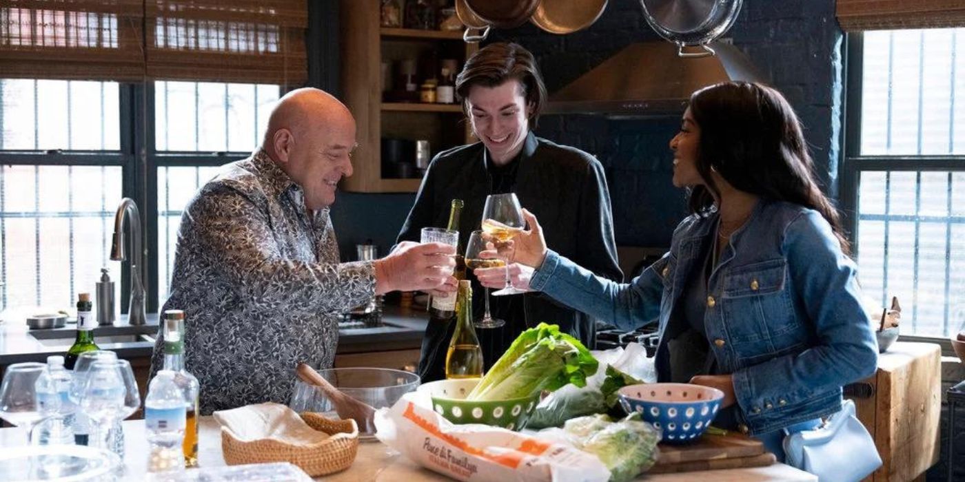 Dean Norris as Randall Stabler toasts Nicky Torchia as Eli Stabler and Kiaya Scott as Becky on Law & Order_ Organized Crime