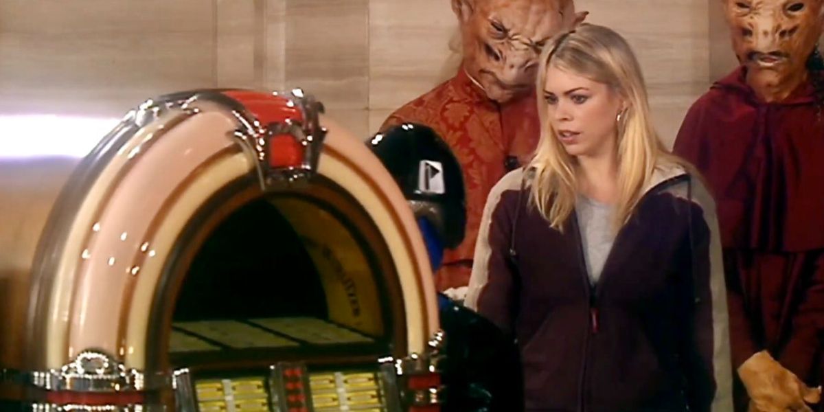 Billie Piper as Rose Tyler beside a jukebox on Platform One on Doctor Who episode, The End of the World.