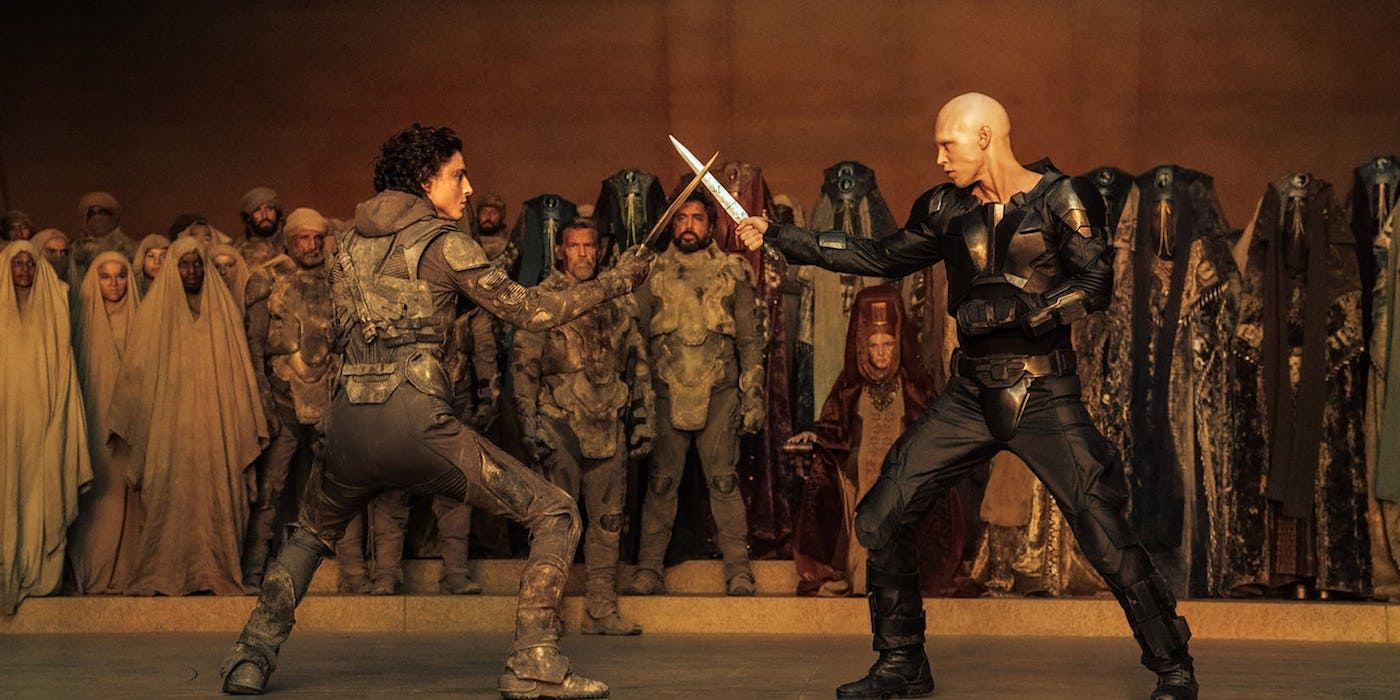 Feyd-Rautha and Paul Atreides fight in Dune: Part Two.