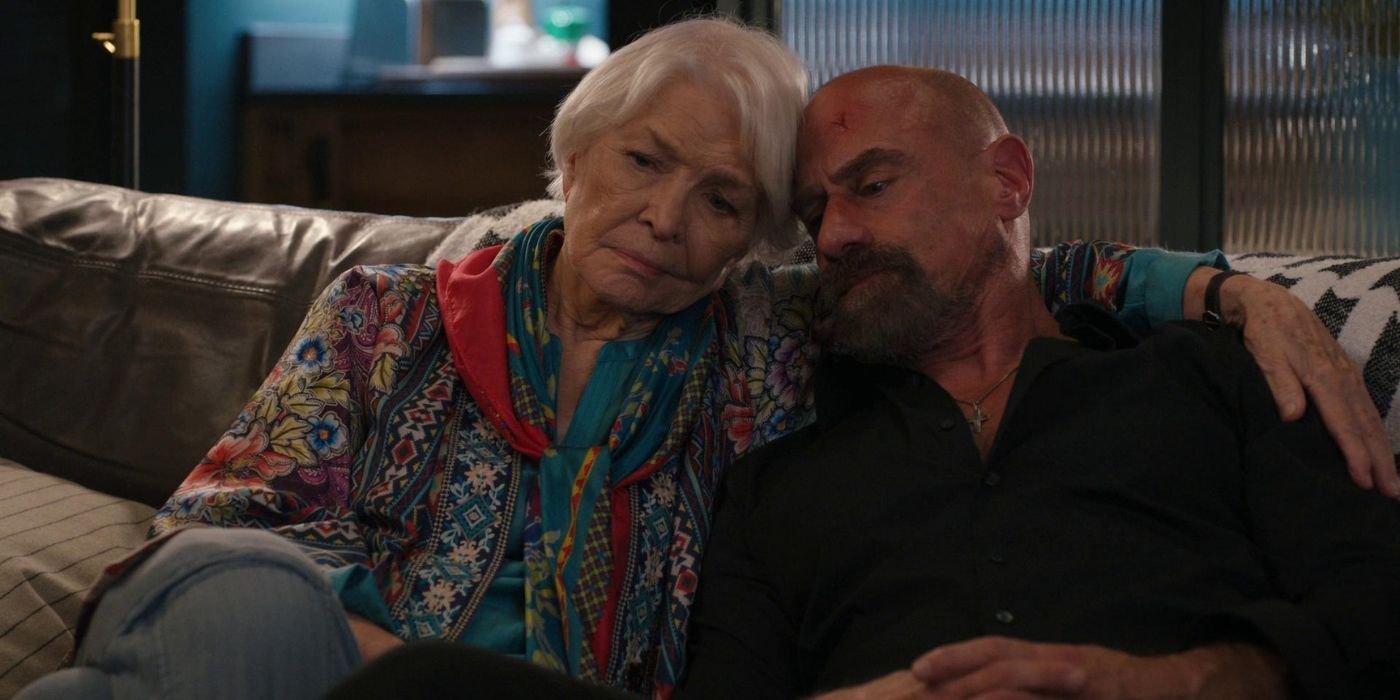 Ellen Burstyn as Bernie Stabler sits on the couch with Christopher Meloni as Elliot Stabler on Law & Order_ Organized Crime