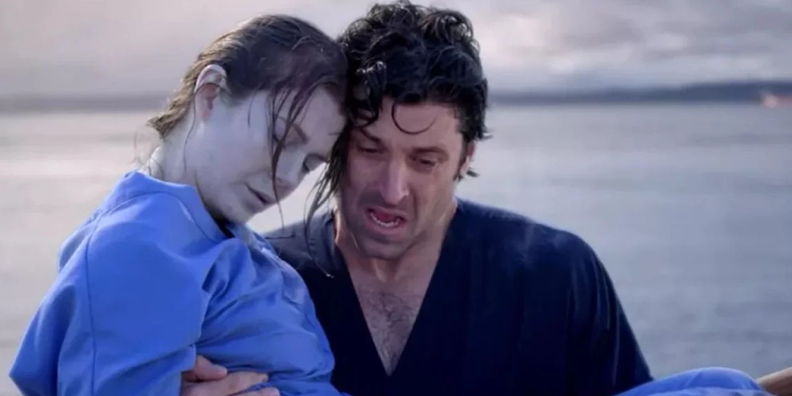 Derek carries a blue Meredith out of the freezing water in Grey's Anatomy Season 3.