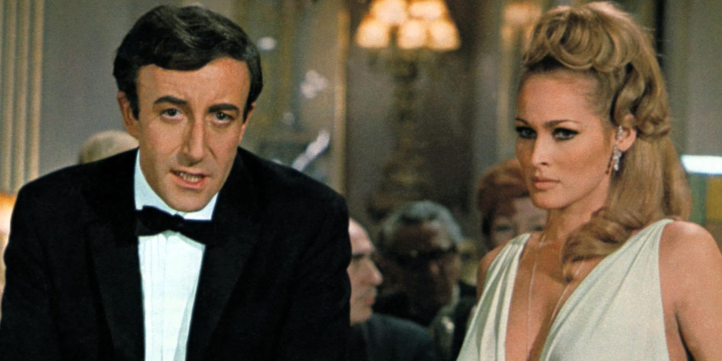 James Bond stands with a lady in Casino Royale (1967)