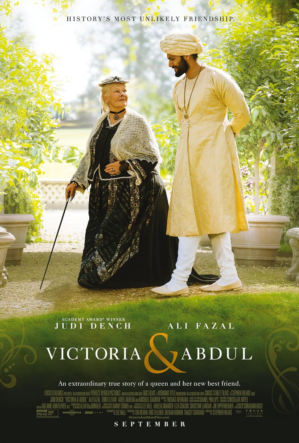 Judi Dench and Ali Fazal walk together on the poster for Victoria and Abdul