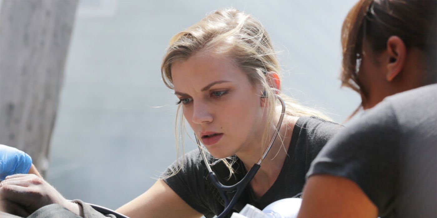 Kara Killmer as Sylvie Brett listens to a patient's lungs on Chicago Fire
