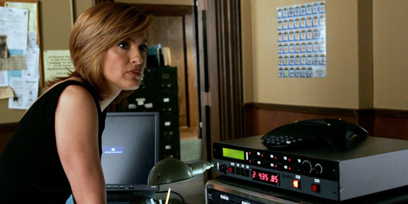 Mariska Hargitay as Olivia Benson stands next to a speaker phone on Law & Order_ SVU