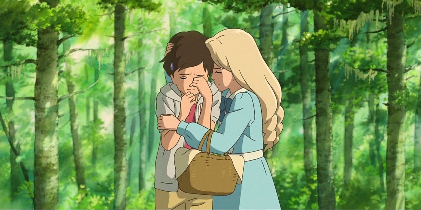 Marnie hugs Anna in the forest in Studio Ghibli's When Marnie Was There