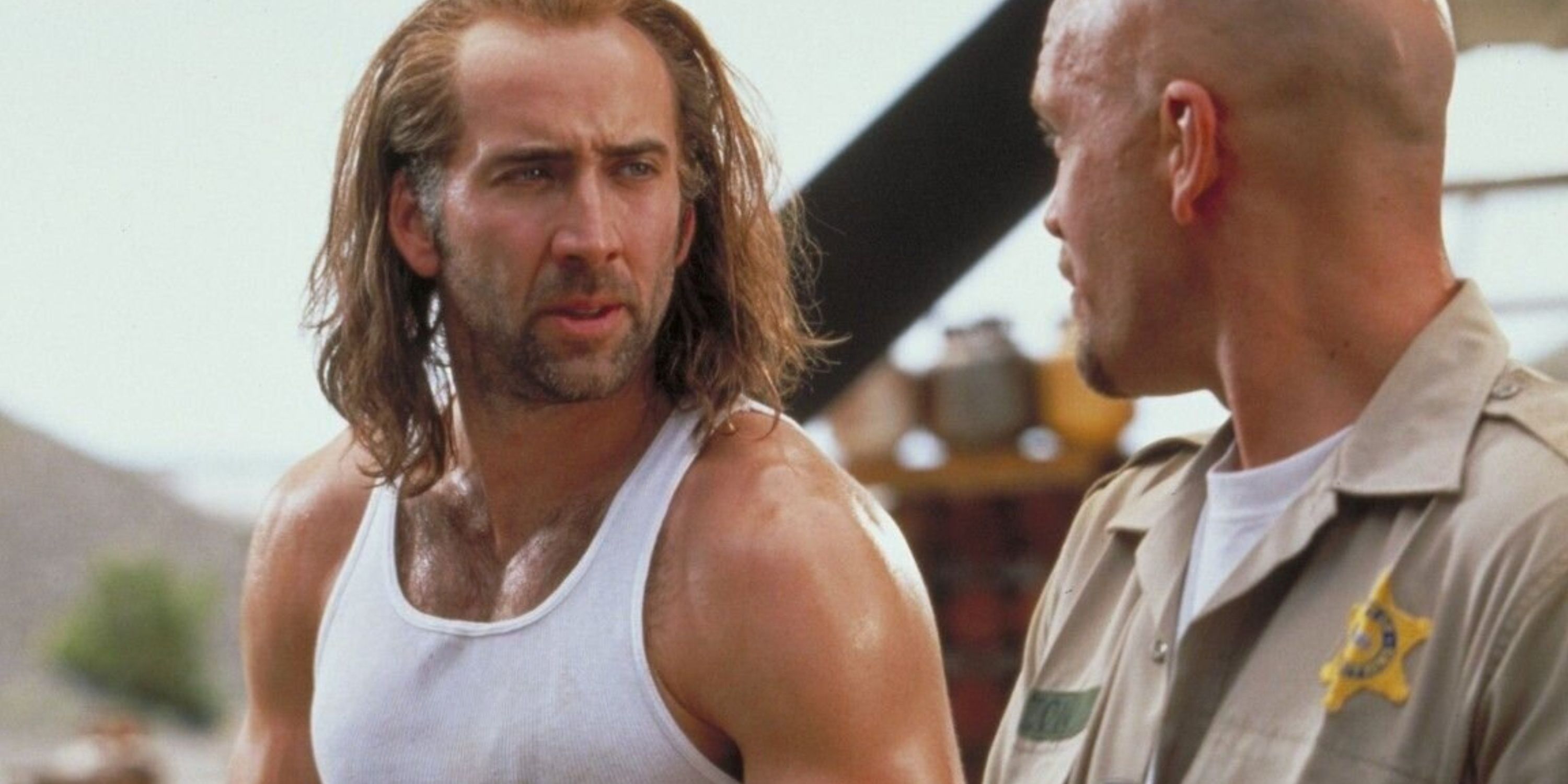 Cameron Poe (Nicolas Cage) talks to Cyrus the Virus (John Malkovich) in Con Air.