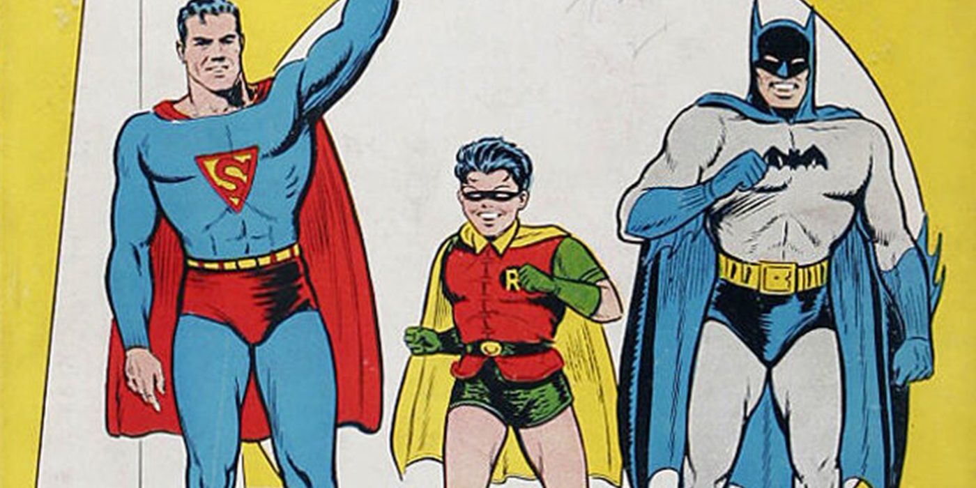Superman posing with Batman and Robin