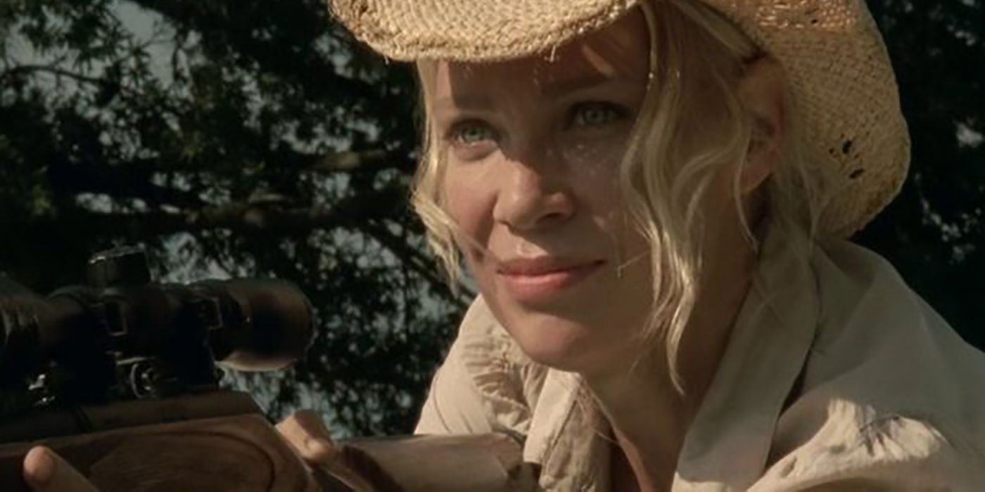 A close-up of Andrea (Laurie Holden) wearing a cowboy hat and holding a rifle on The Walking Dead.