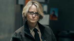 Liz Danvers (Jodie Foster) looking perplexed as she examines evidence in True Detective: Night Country