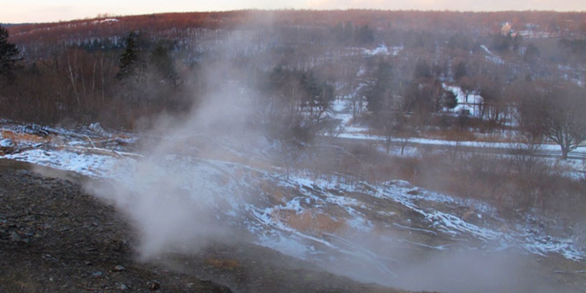 Smoke rising over the town from the fires burning in the underground mines of Centralia, PA