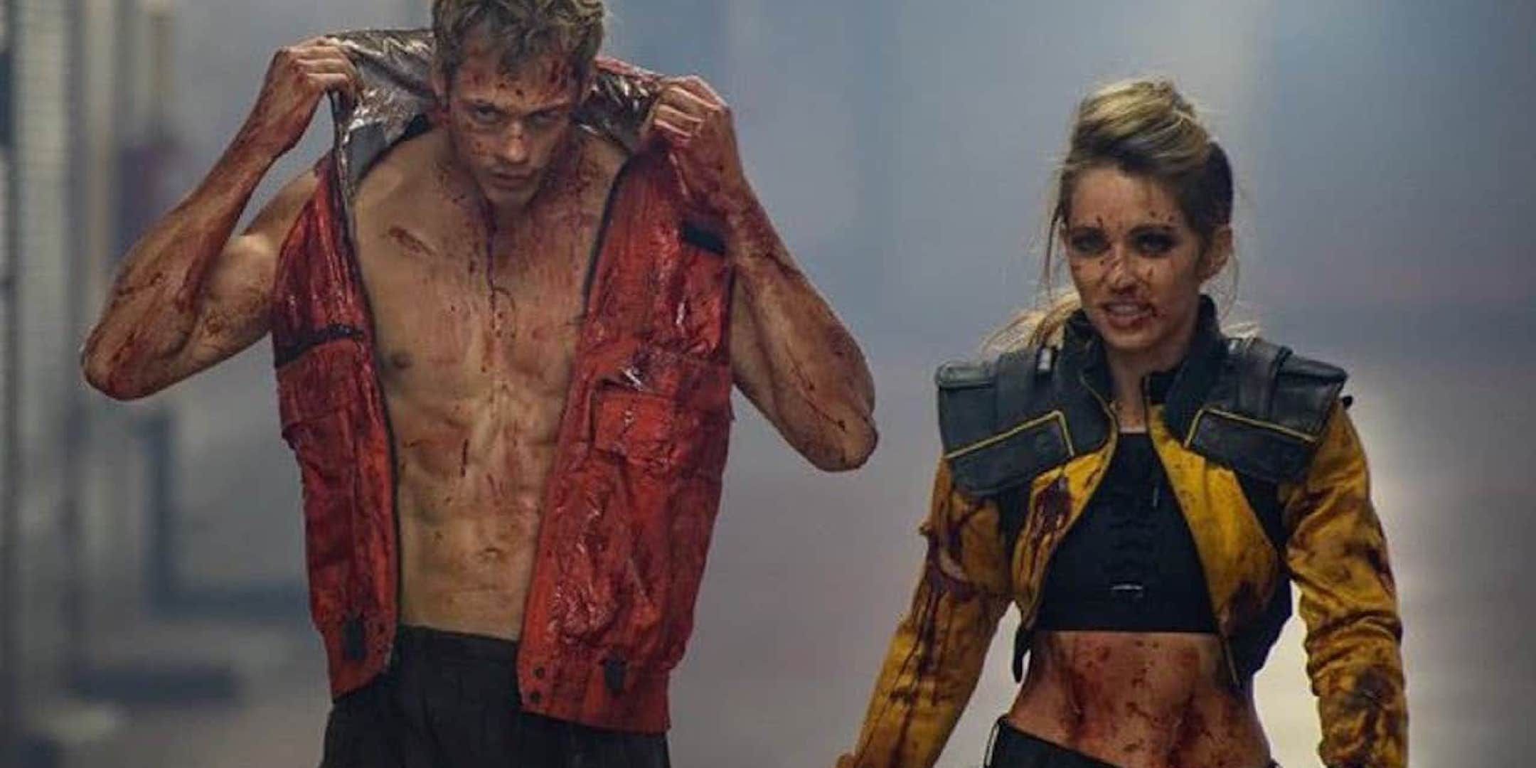 A bloodied Boy and June walk together in Boy Kills World