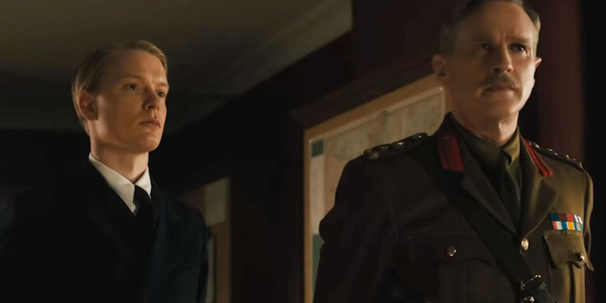 Freddie Fox as Ian Fleming stands next to Cary Elwes Brigadier Gubbins 'M'