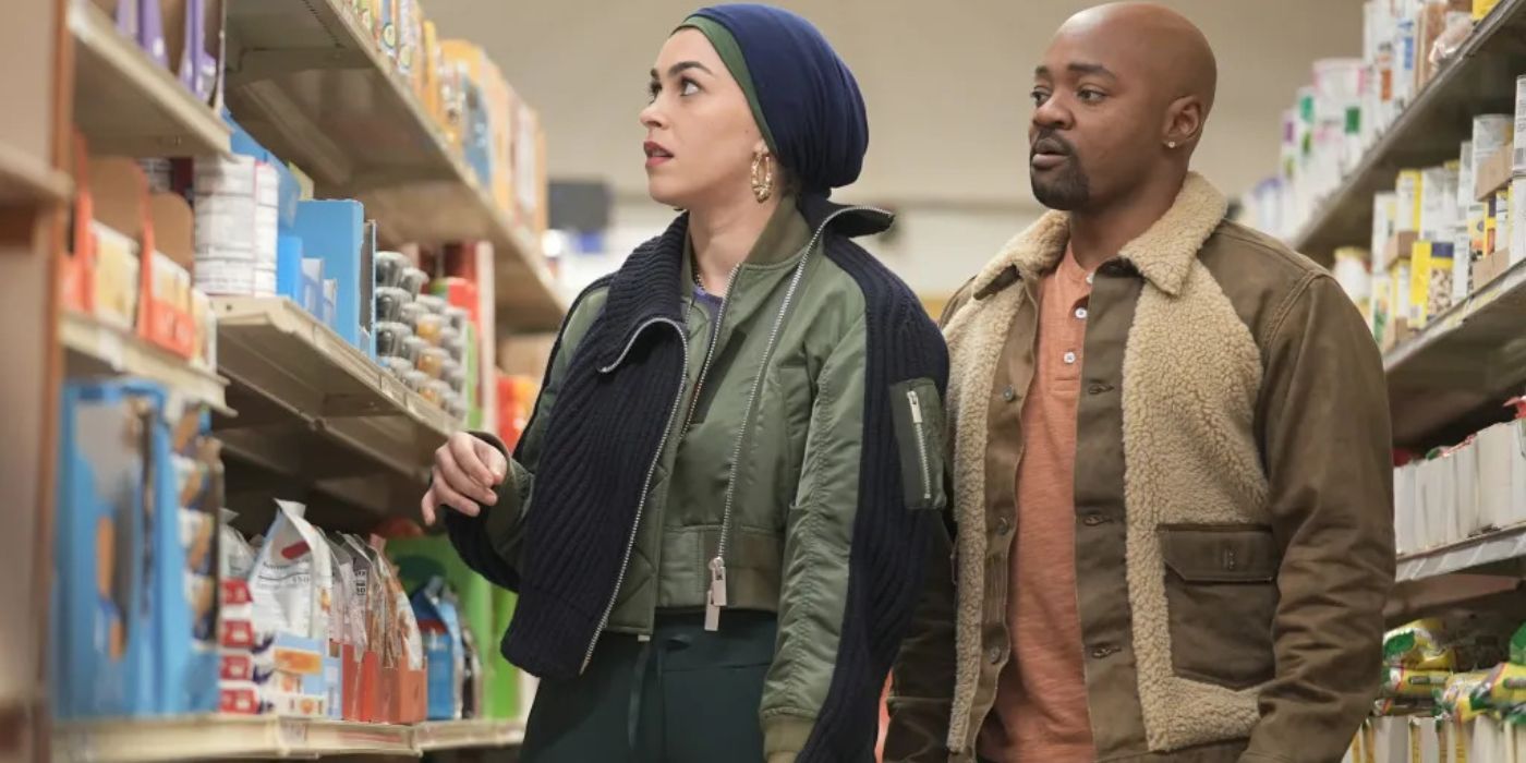 Marjan Marwani (Natacha Karam) and Paul Strickland (Brian Michael Smith) in a grocery store in 911 Lone Star episode "Swipe Left"