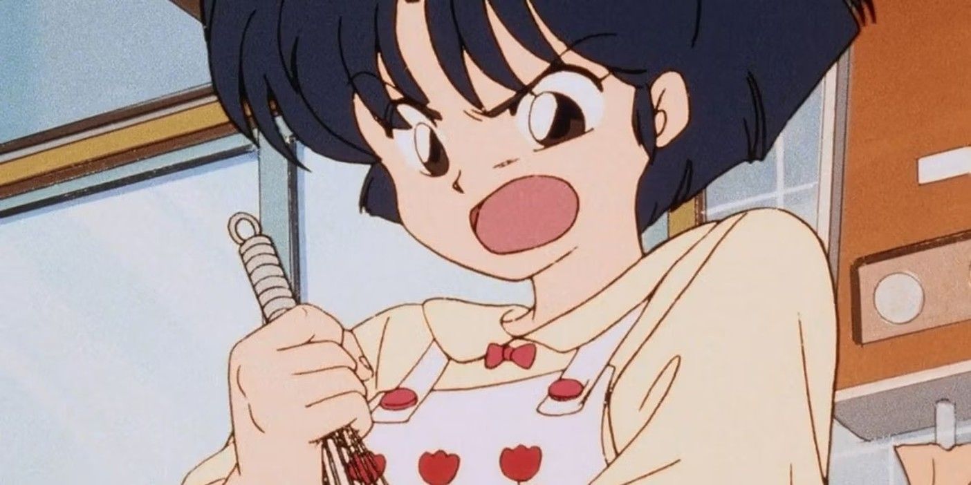 Akane tendo cooks while looking bored.